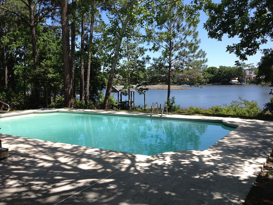 Breathtaking view of pool and bayou