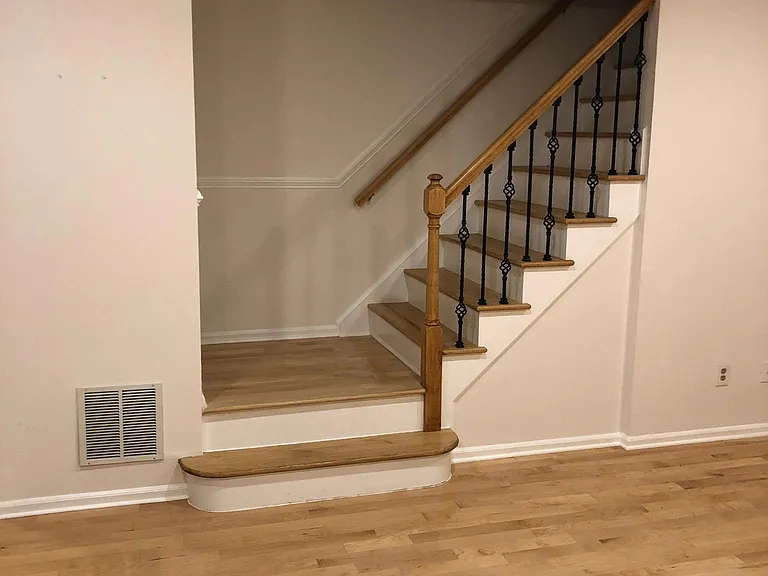 Updated staircase and hardwood flooring.