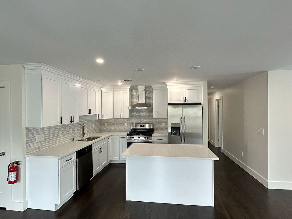 Sleek, modern kitchen with stainless steel appliances