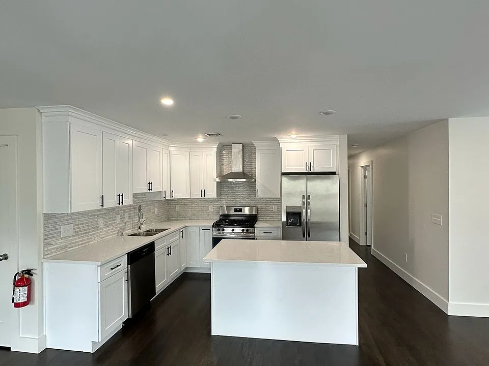 Sleek, modern kitchen with stainless steel appliances