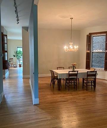 Down the hall toward the kitchen and rear of house.