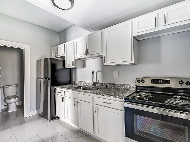 1257 Leonhard St — Photo 13