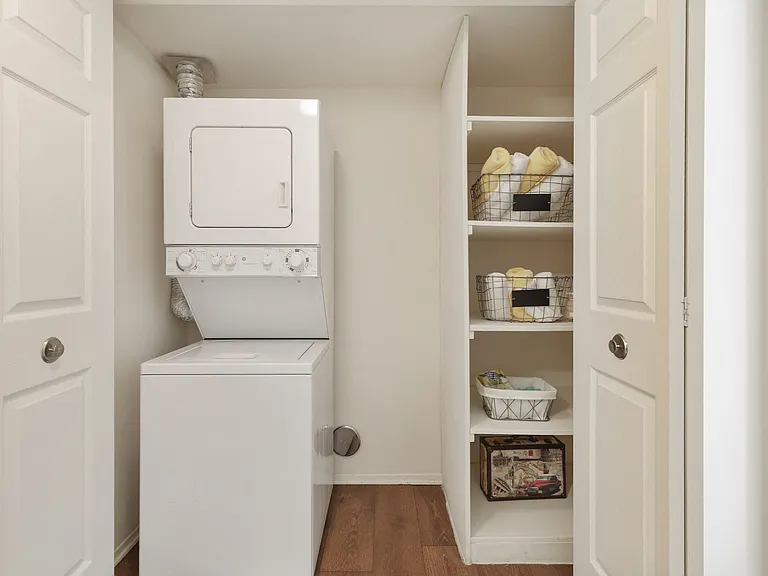 Spacious In-unit Laundry and Linen Closet at Lakeside Village Apartments Clinton Township MI