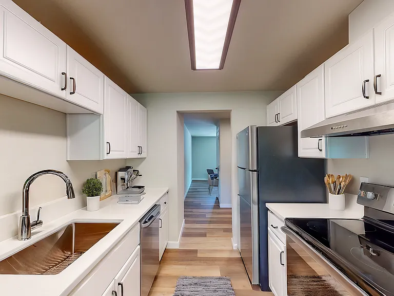 Experience culinary elegance in this stunning, modern kitchen space. Experience culinary elegance in this stunning, modern kitchen space.