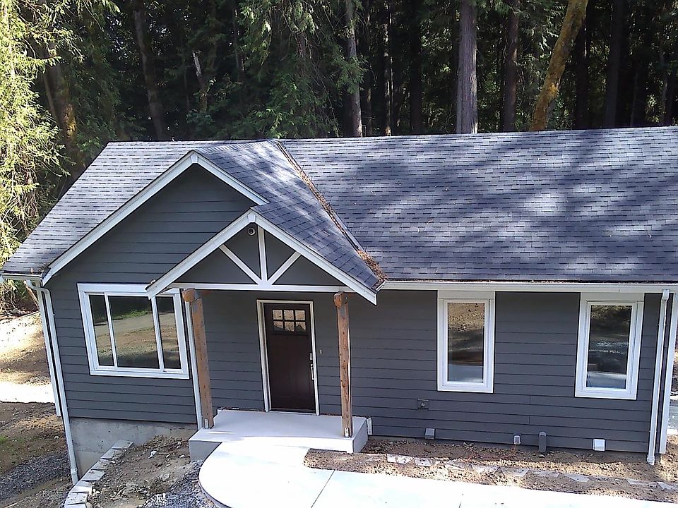 Front of house. Level entry and small porch.