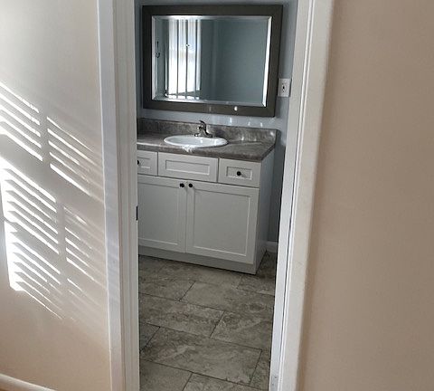 Master bath sink and mirror.