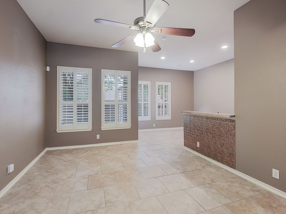 Living room, dinning area and bar to kitchen.