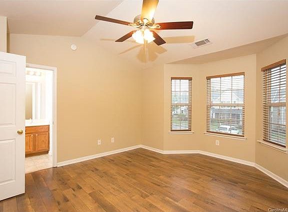 Upstairs Master Bedroom With Bay Window And Walk-In Closet