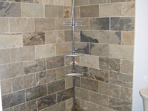 Gorgeous, large walk-in slate shower!