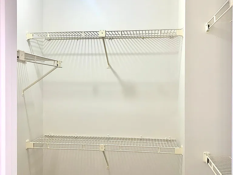 WALK IN CLOSET/ MASTER BEDROOM
