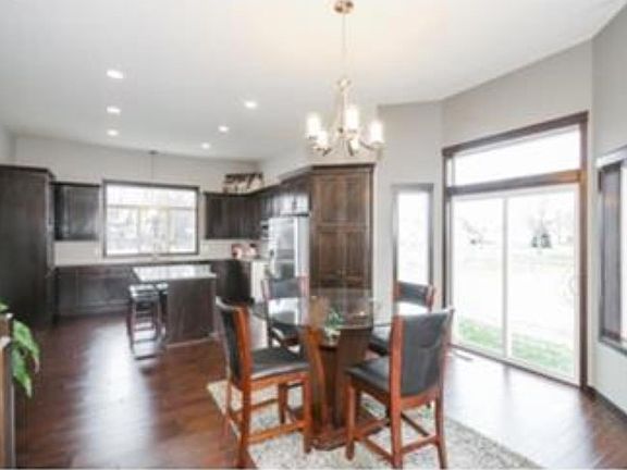 Spacious open floor plan, with beautiful upgraded laminate floors! The kitchen has many cabinets with 2 pantries!