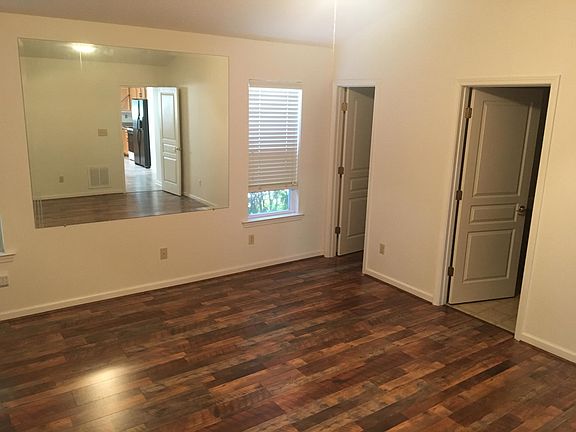 Master bedroom doors to walk-in closet and master bath.