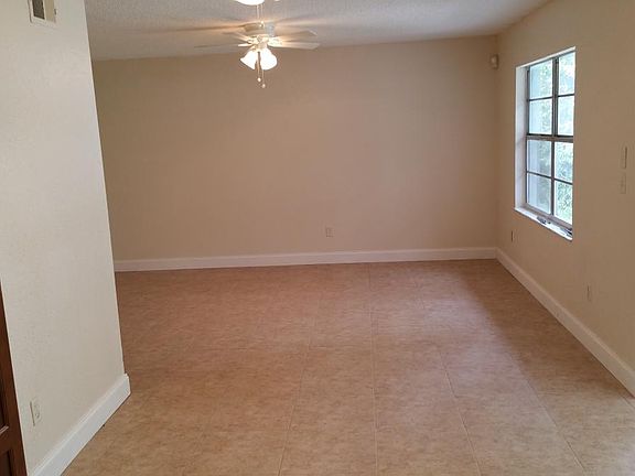Dining area between living room and kitchen. Opens to family room.