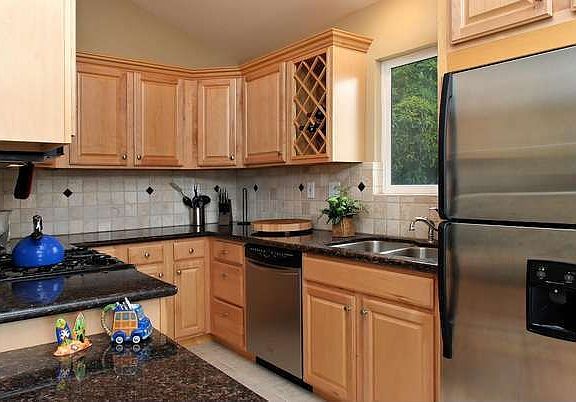 Maple Cabinetry, Stainless Appliances, Granite Counters