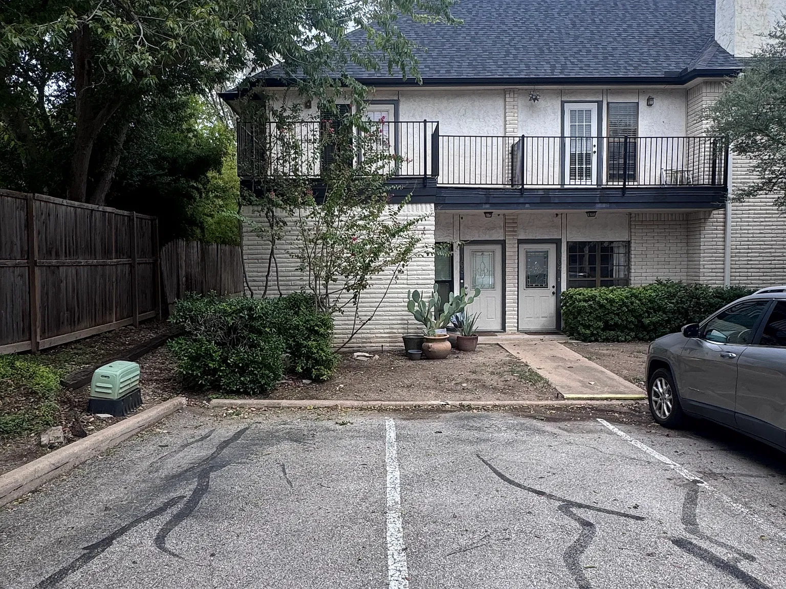 Front of unit, 2 reserved parking spaces