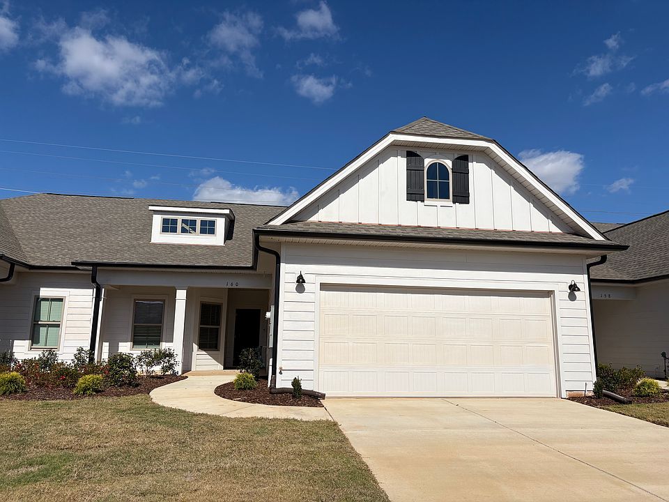 Exterior with a porch and two car garage
