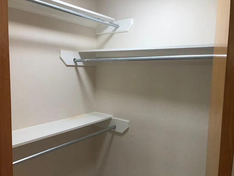 two master closets in bathroom