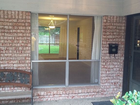 Front porch looking into the livingroom and dining room