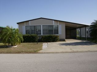 724 Oleander Cir, Barefoot Bay, FL 32976