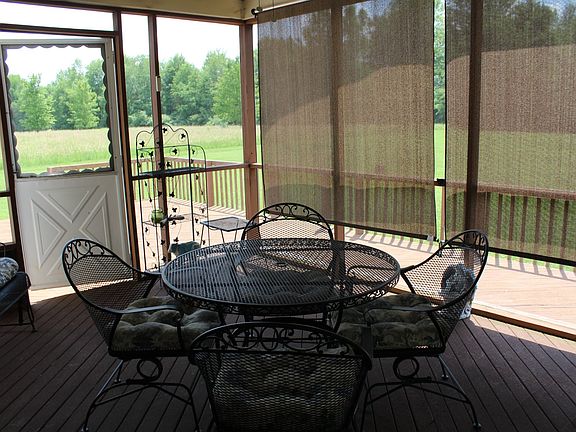 Screened-in back porch 