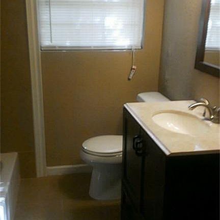 Remodeled restroomNew tub,sink,toilet,tiled shower and new vanity
