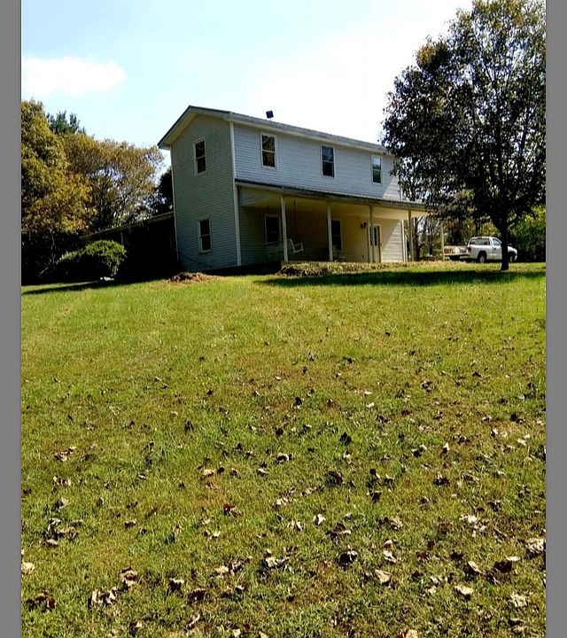 Large yard and side porch.
