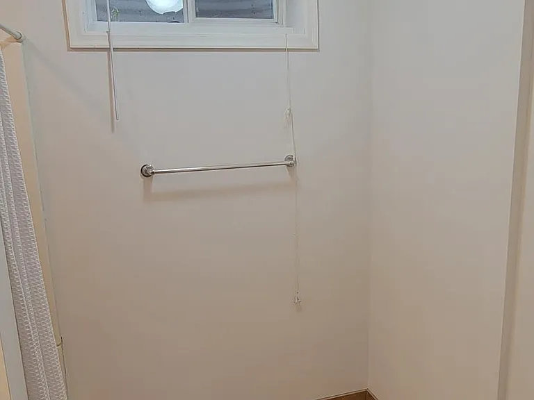 Lower-level bathroom. Floor tile is stunning and slip resistant.