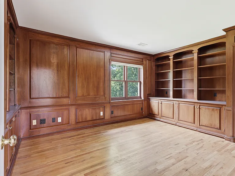 Sophisticated office - floor-to-ceiling built-ins.