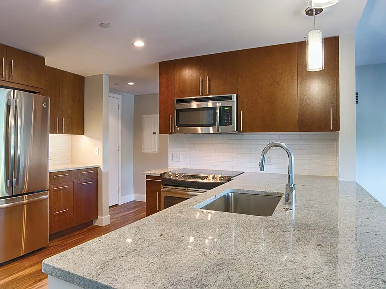 Quartz vanity countertops, spacious walk-in showers, and ample lighting are featured in our penthouse bathrooms