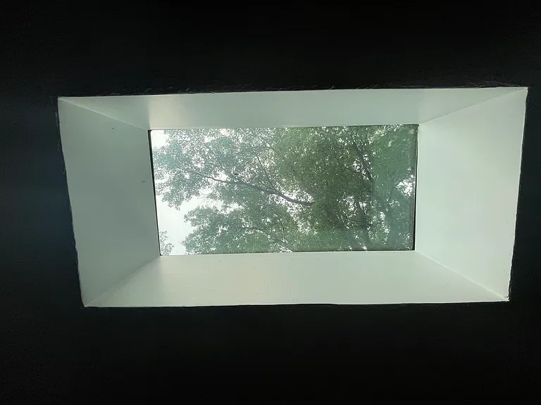 Daydream with coffee in your kitchen with lovely, expansive skylight.