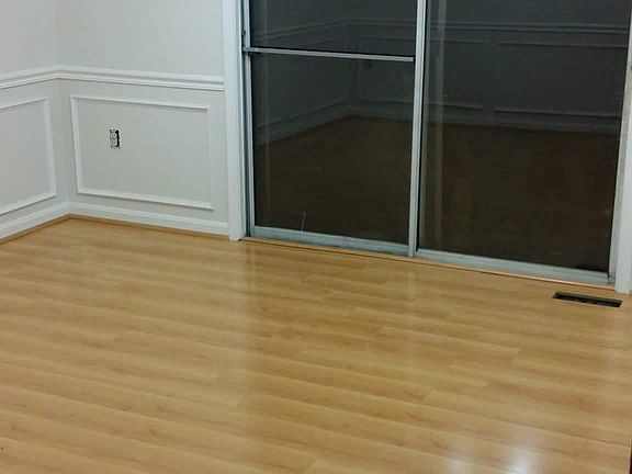 Dining room photographed before door was replaced 