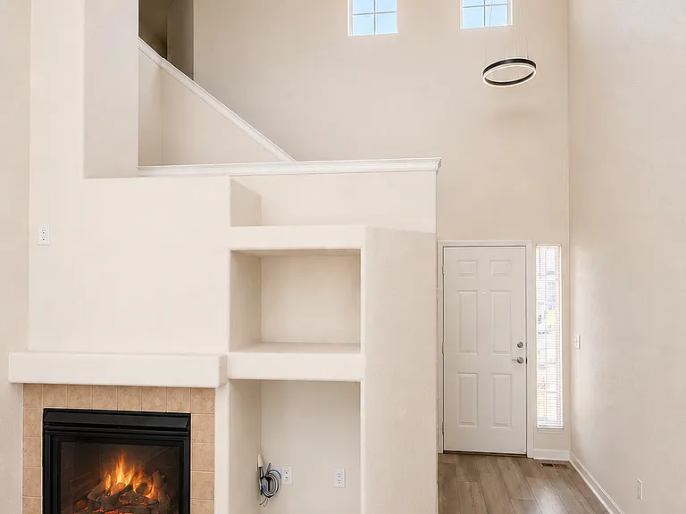 Living room, fireplace, main entrance