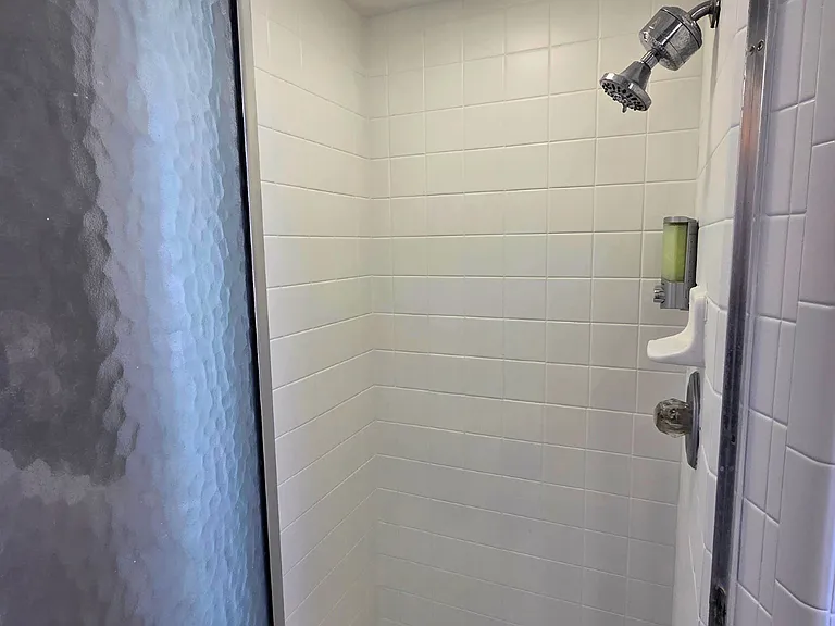 Spotless glass shower creating a calm and cozy atmosphere