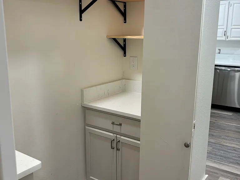 Bulter's pantry with outlets drawers, cabinets and shelfing