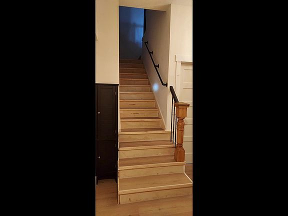 Stairs from hallway to apt.