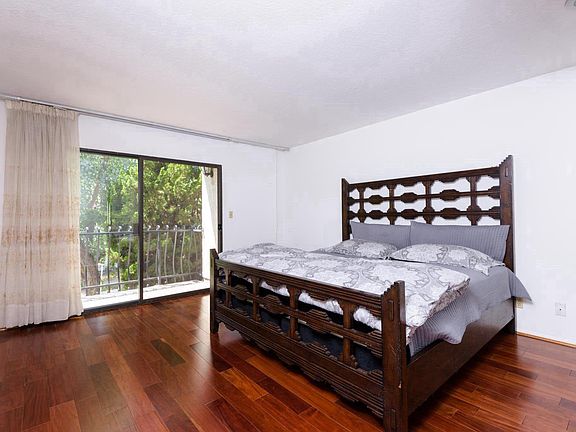 Master bedroom with balcony