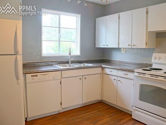 Remodeled kitchen with new range/oven, refrigerator, light fixtures, granite loo