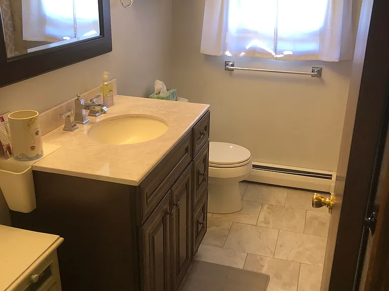 Upstairs full bathroom with tub and shower