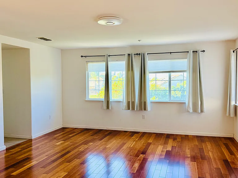 Spacious primary bedroom with lake views