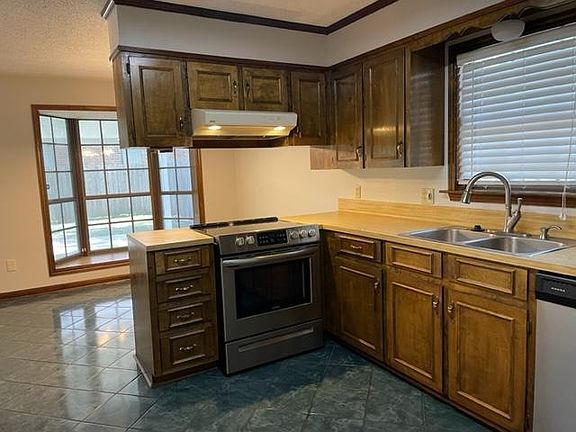 Kitchen and Dining Area, New Stove and Dishwasher