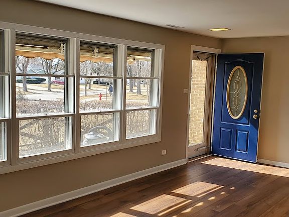 Living room front windows and door.
