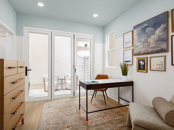 Plan 1A model home optional den shown in lieu of bedroom.