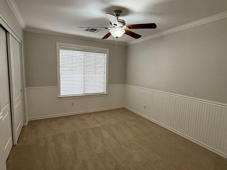 Bedroom 3 bright, versatile bedroom, perfect for guests, family, or a home office.