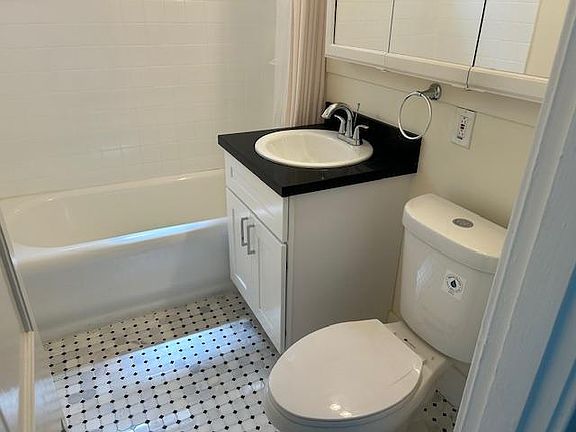 Bathroom featuring marble floor