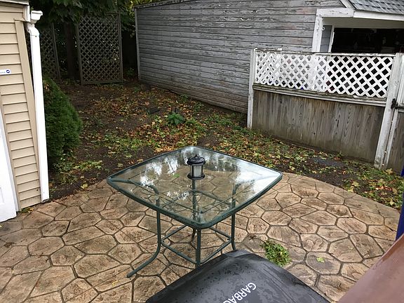 Beautiful back patio with stamped concrete floor