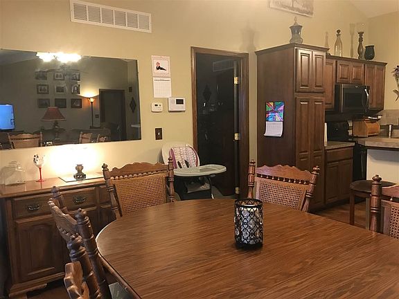 Dining room has open floor plan. View from siders back to the kitchen.