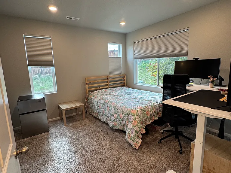 First floor bedroom, separate from the upstairs bedrooms for additional privacy.