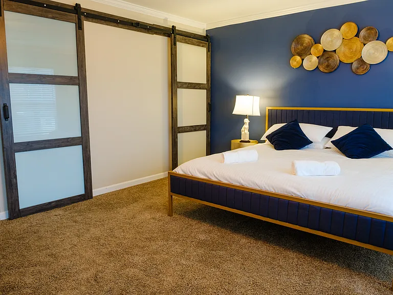 Master bed and walk in wardrobe