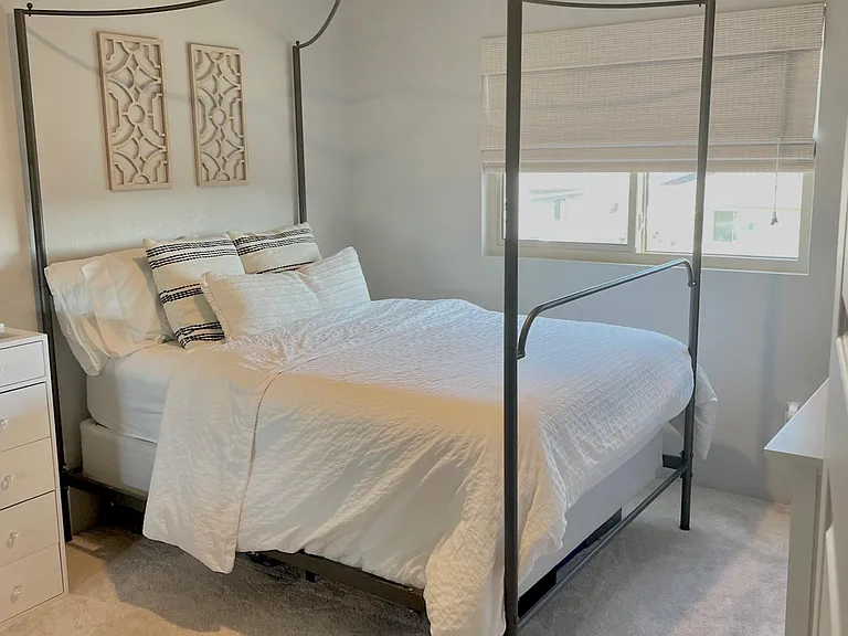 Bedroom 3 facing with front house view.