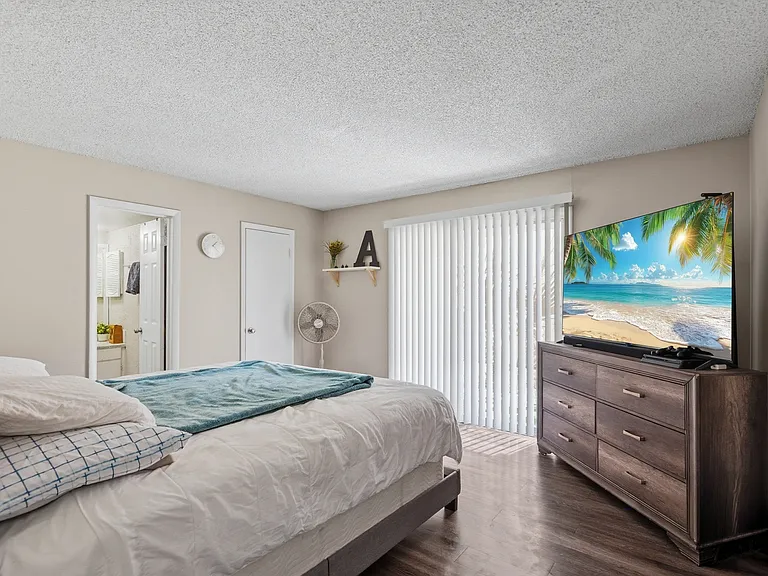 Welcome to Wymore 360 Apartments, where comfort meets style! This spacious bedroom features modern decor, natural light, and an inviting atmosphere. Relax and unwind in your personal retreat. Schedule your tour today to see it in person!